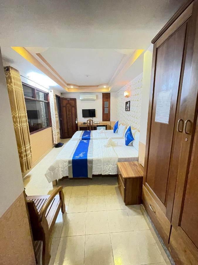 Khach San Hong Phat Хошимин Экстерьер фото